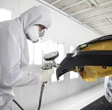 Collision Center Technician Painting a Vehicle | McGavock Toyota in Pampa TX
